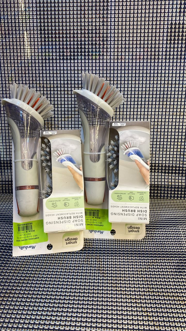 Mini soap dispensing dish brush